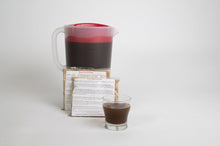 Load image into Gallery viewer, pitcher of essiac tea with two packets and a cup of tea