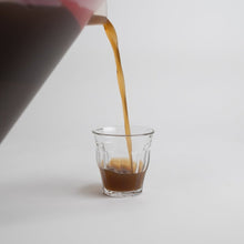 Load image into Gallery viewer, pouring essiac into a cup