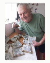 Load image into Gallery viewer, man driking genuine essiac with bags
